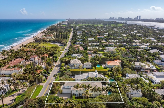 aerial view with a beach view and a water view