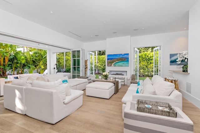 living area featuring light wood-style flooring