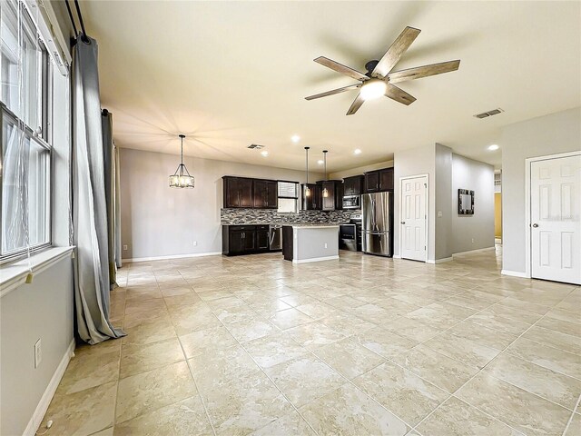 unfurnished living room featuring a ceiling fan, recessed lighting, visible vents, and baseboards