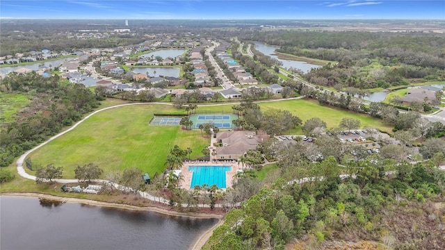 birds eye view of property featuring a residential view and a water view