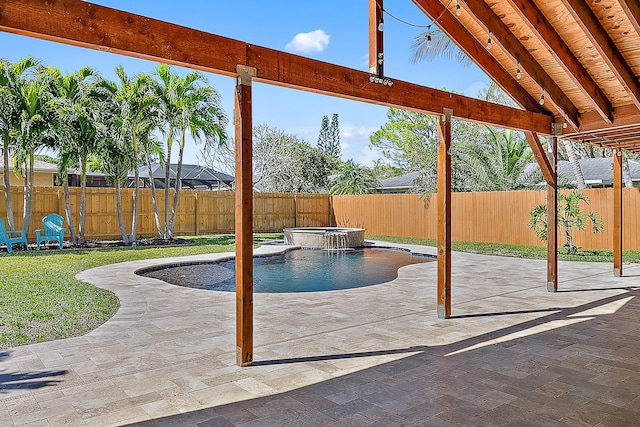 view of pool featuring a fenced backyard, a pool with connected hot tub, a lawn, and a patio