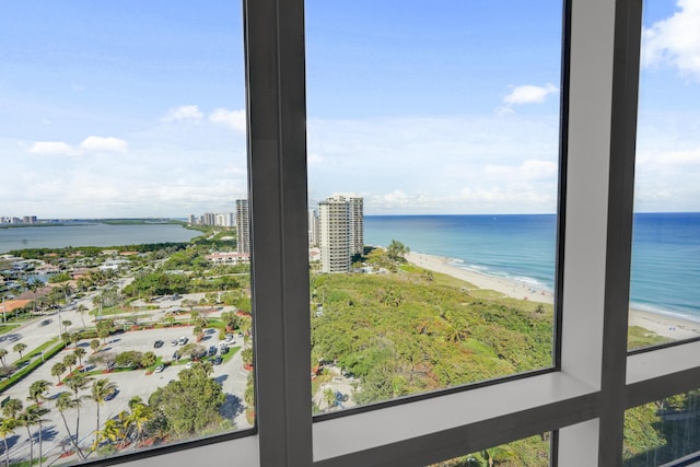 view of water feature with a view of city and a beach view