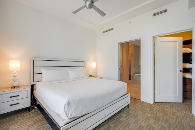 bedroom with ceiling fan, carpet, and visible vents