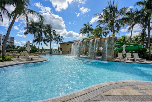 community pool with a patio area