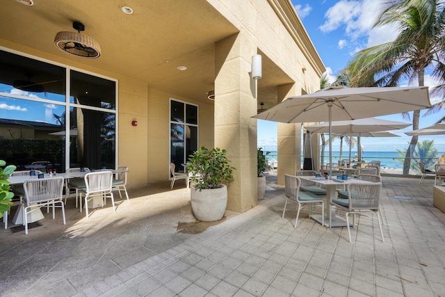 view of patio featuring outdoor dining area