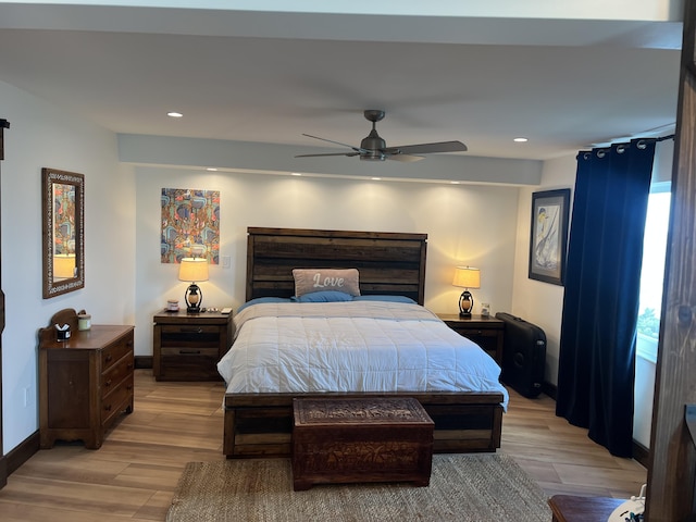 bedroom featuring a ceiling fan, recessed lighting, baseboards, and light wood finished floors