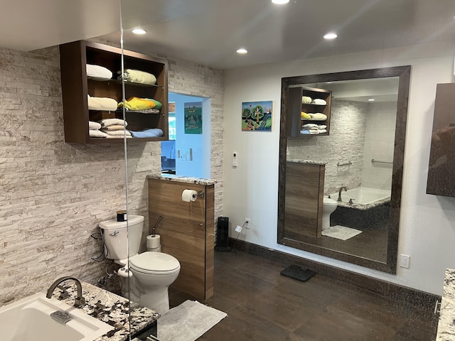 full bath featuring toilet, tile patterned floors, a bath, and recessed lighting