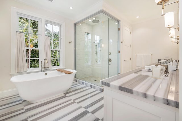 bathroom with crown molding, recessed lighting, a freestanding tub, and a shower stall