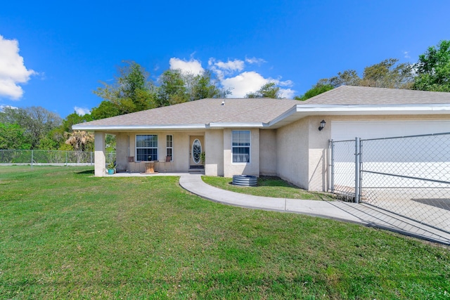 ranch-style home featuring a garage, fence, driveway, stucco siding, and a front lawn