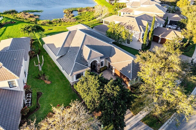 aerial view featuring a residential view and a water view