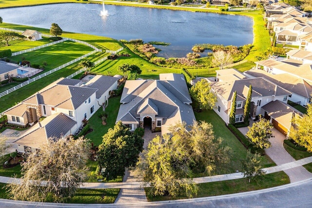 aerial view featuring a water view and a residential view