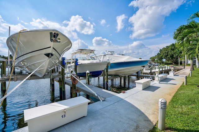 view of dock with a water view and boat lift