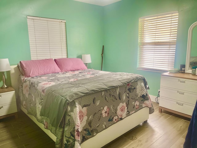 bedroom featuring light wood finished floors