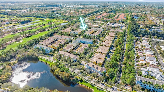 bird's eye view featuring a water view and a residential view