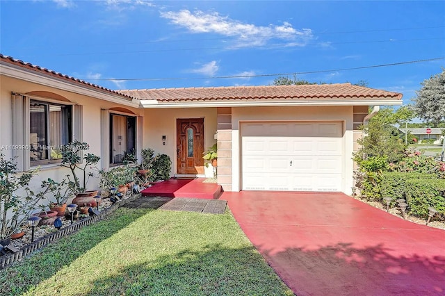 view of front of home featuring a garage, concrete driveway, a front yard, and stucco siding