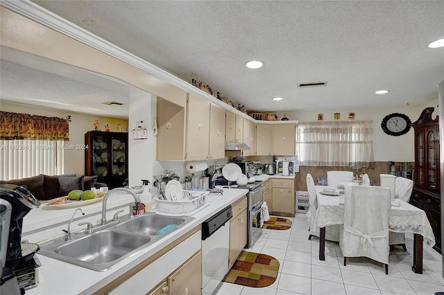 kitchen featuring range with two ovens, white dishwasher, light countertops, under cabinet range hood, and a sink