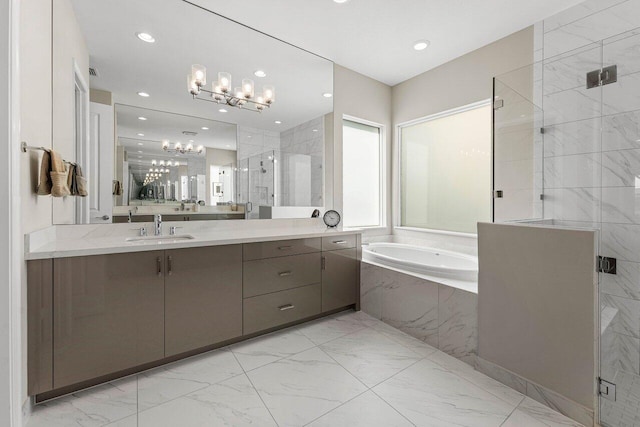 full bathroom with marble finish floor, a garden tub, vanity, a shower stall, and recessed lighting