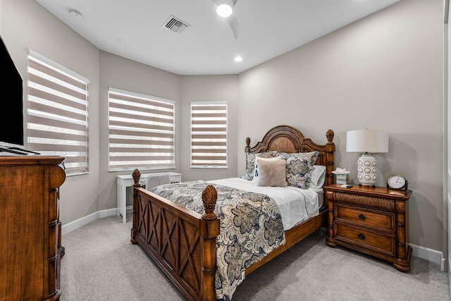 bedroom with recessed lighting, light colored carpet, visible vents, ceiling fan, and baseboards