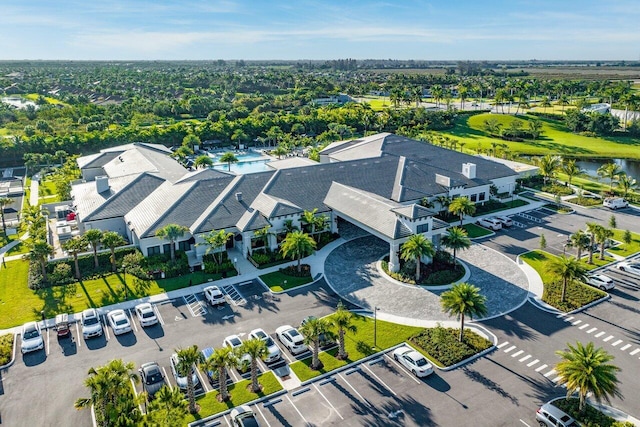 drone / aerial view featuring a water view and a residential view