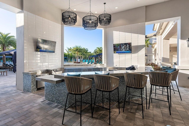 view of patio with outdoor wet bar