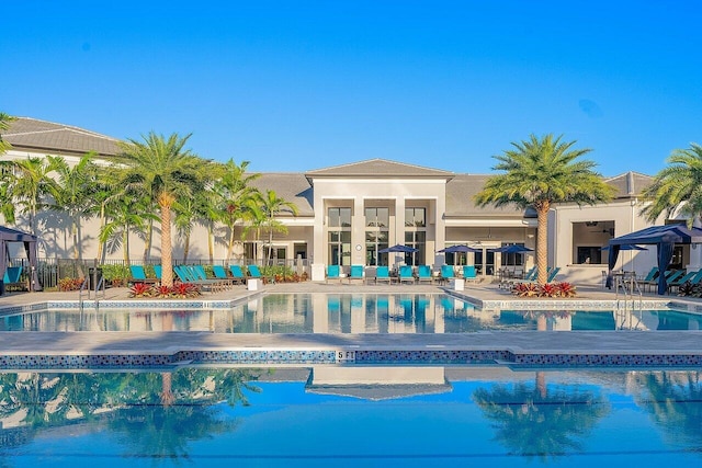 community pool with a patio