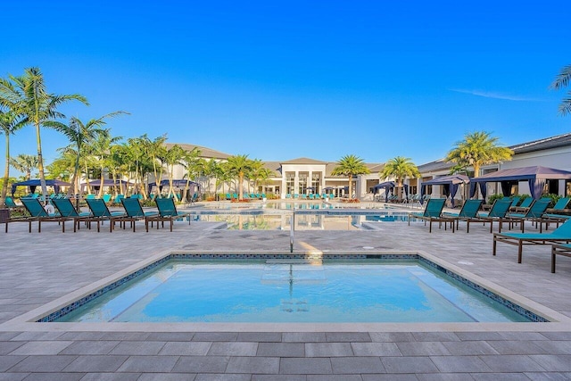 community pool featuring a patio area