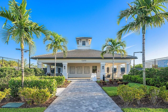 view of front of house featuring a porch and stucco siding