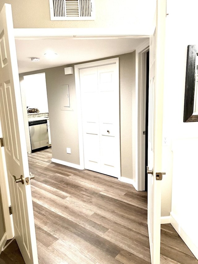 1548 SE Royal Green Cir Unit 105, Port Saint Lucie, FL 34952 - hall with wood finished floors and baseboards