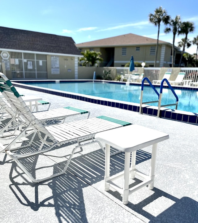 1548 SE Royal Green Cir Unit 105, Port Saint Lucie, FL 34952 - community pool with a patio area
