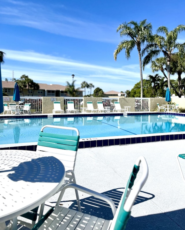 1548 SE Royal Green Cir Unit 105, Port Saint Lucie, FL 34952 - community pool with a patio