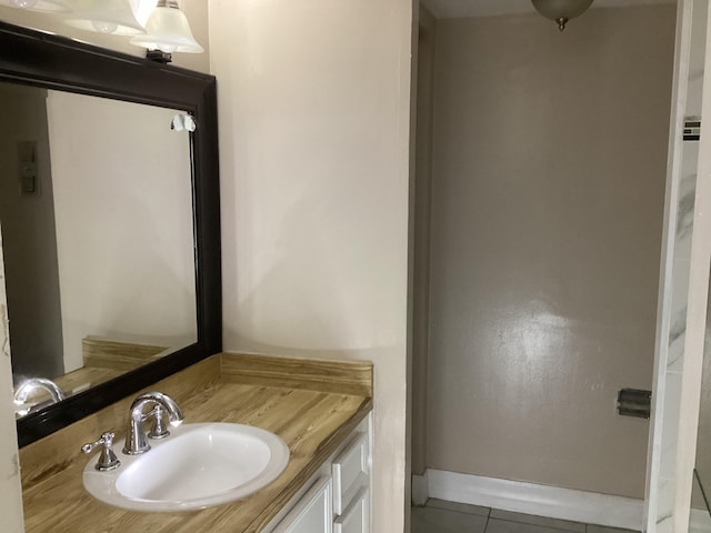 bathroom with vanity and tile patterned floors