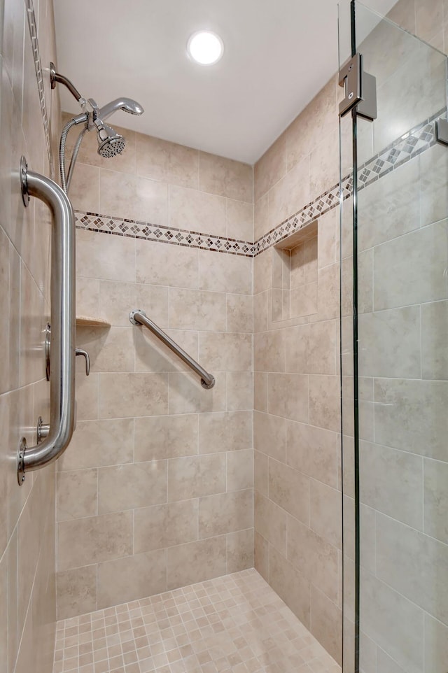 bathroom featuring a stall shower