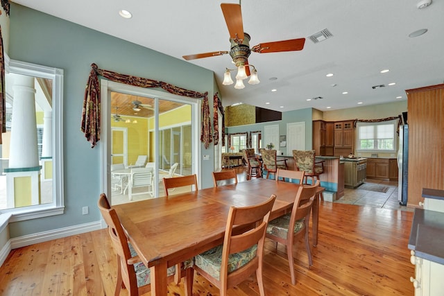 dining space with light wood-type flooring, visible vents, baseboards, and recessed lighting