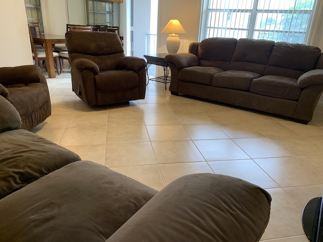 750 Burgundy P, Delray Beach, FL 33484 - living room with light tile patterned floors and healthy amount of natural light