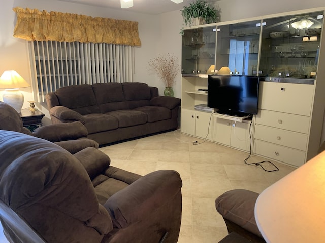 living room with light tile patterned floors