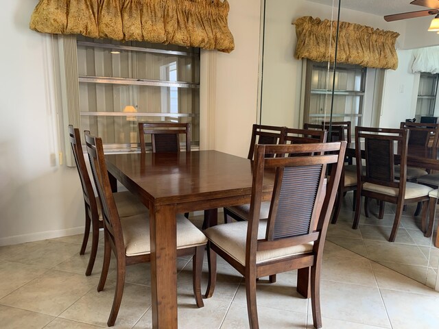 750 Burgundy P, Delray Beach, FL 33484 - dining area with ceiling fan, tile patterned floors, and baseboards