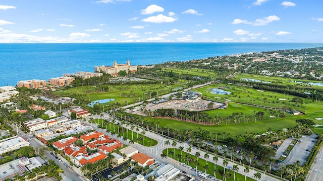 aerial view with a water view and golf course view