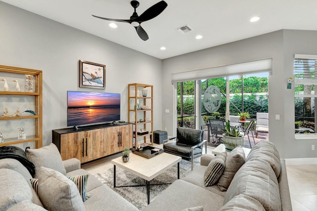 living area with baseboards, visible vents, a ceiling fan, and recessed lighting