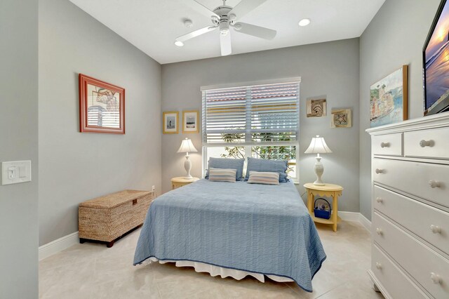 bedroom with light tile patterned flooring, ceiling fan, baseboards, and recessed lighting