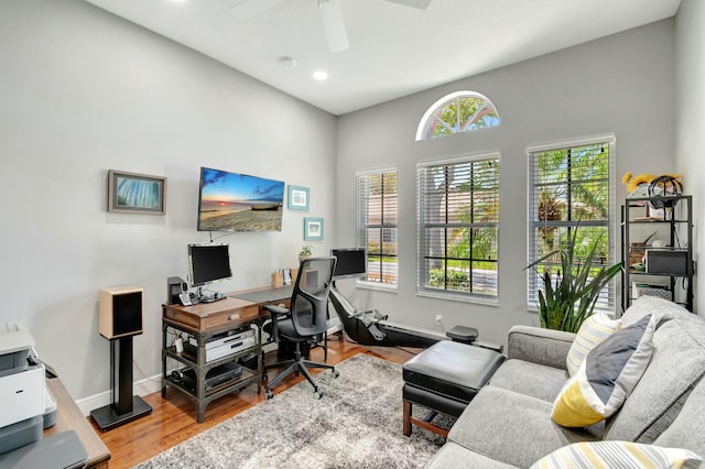 office area featuring ceiling fan, recessed lighting, wood finished floors, and baseboards