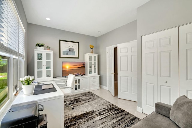 office space featuring baseboards and recessed lighting