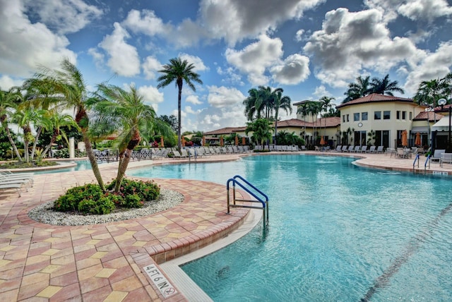 community pool with a patio