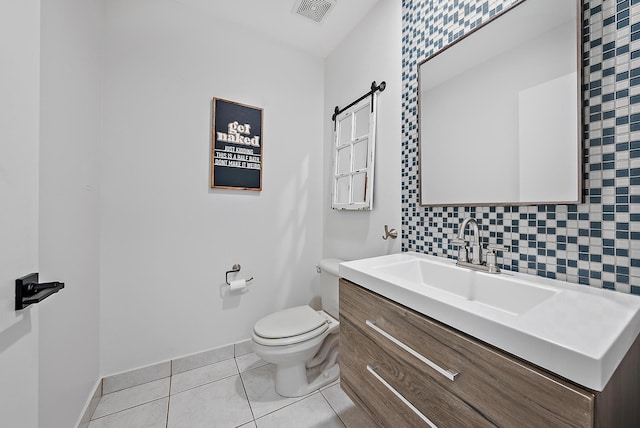 bathroom with tasteful backsplash, visible vents, toilet, vanity, and tile patterned floors