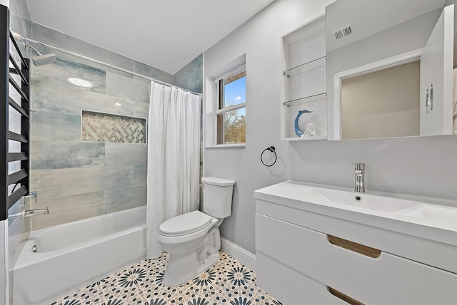 bathroom with shower / tub combo with curtain, visible vents, toilet, vanity, and baseboards