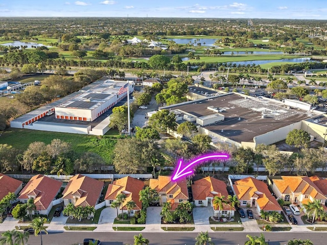 aerial view with a water view and a residential view