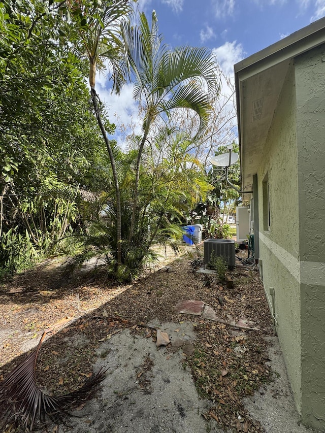 view of yard featuring central AC