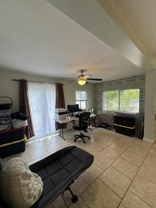 tiled office with a ceiling fan