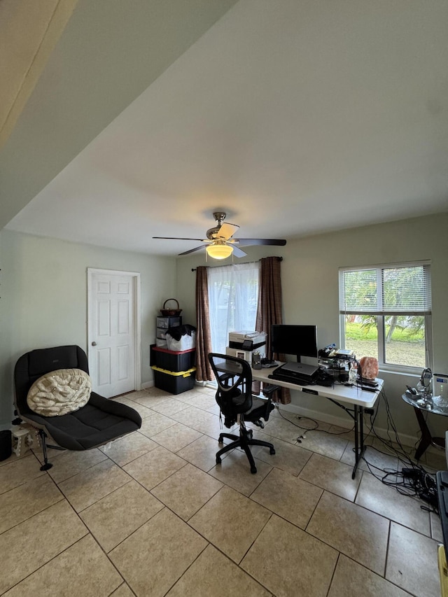 home office with light tile patterned flooring