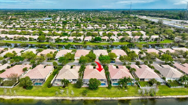 aerial view with a residential view and a water view