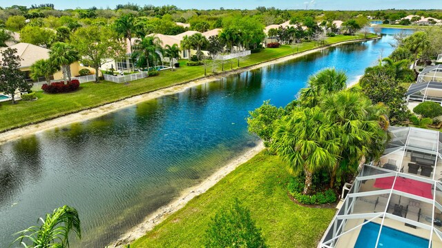 bird's eye view with a residential view and a water view